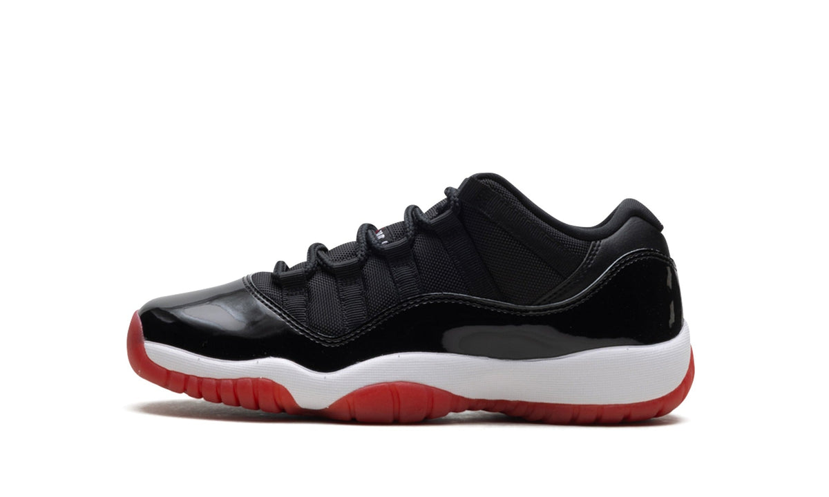 Air Jordan 11 Low Sneakers - Black, White & Red