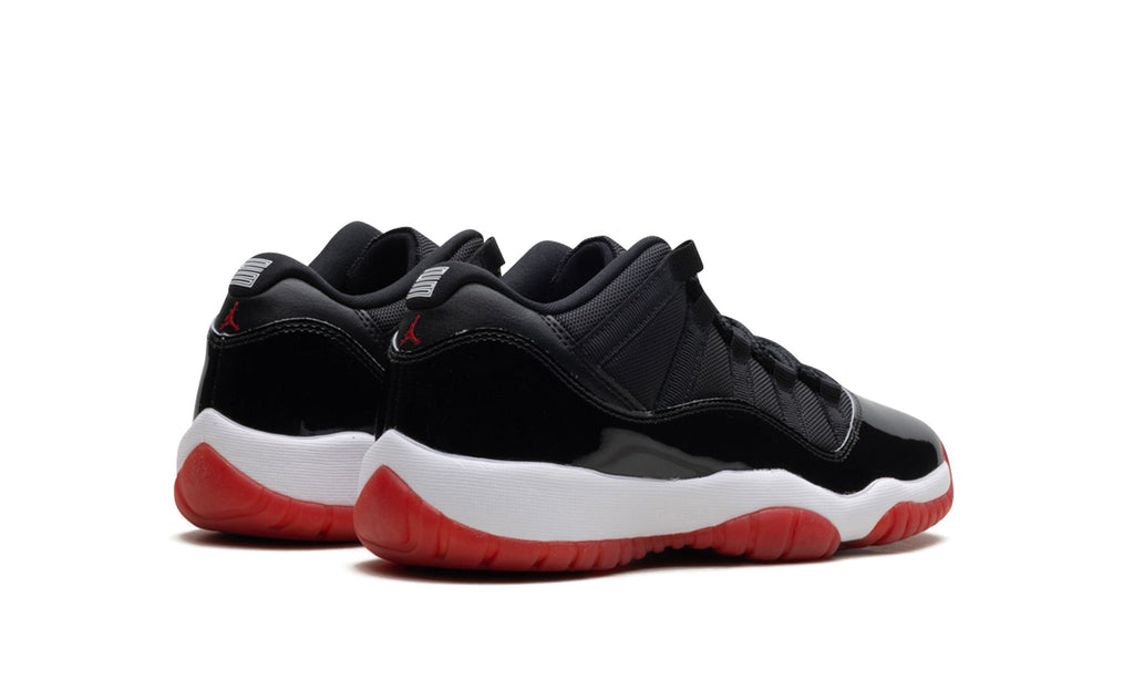 Air Jordan 11 Low Sneakers - Black, White & Red