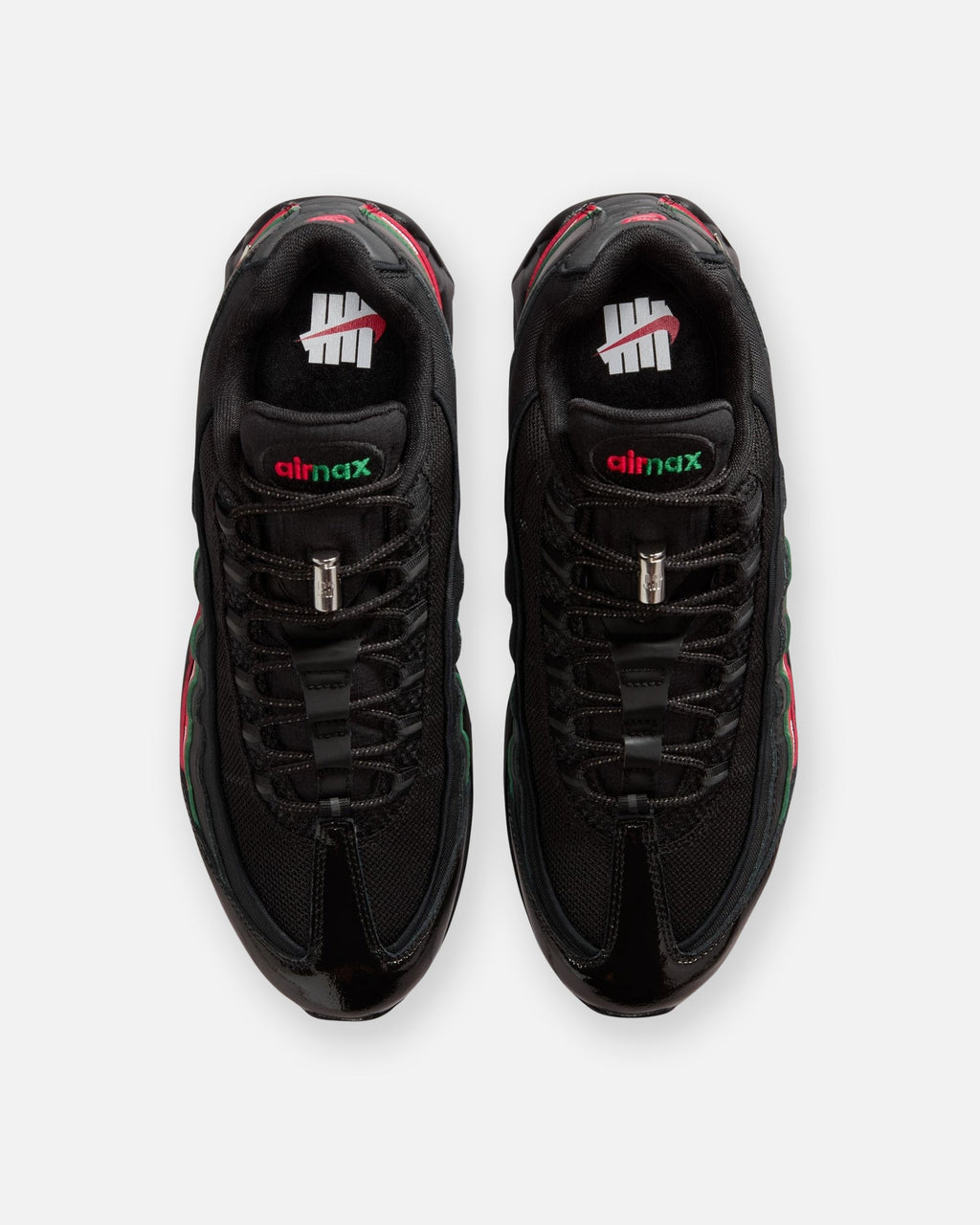 UNDEFEATED x Nike Air Max 95 Sneakers – Black with Red & Green Accents