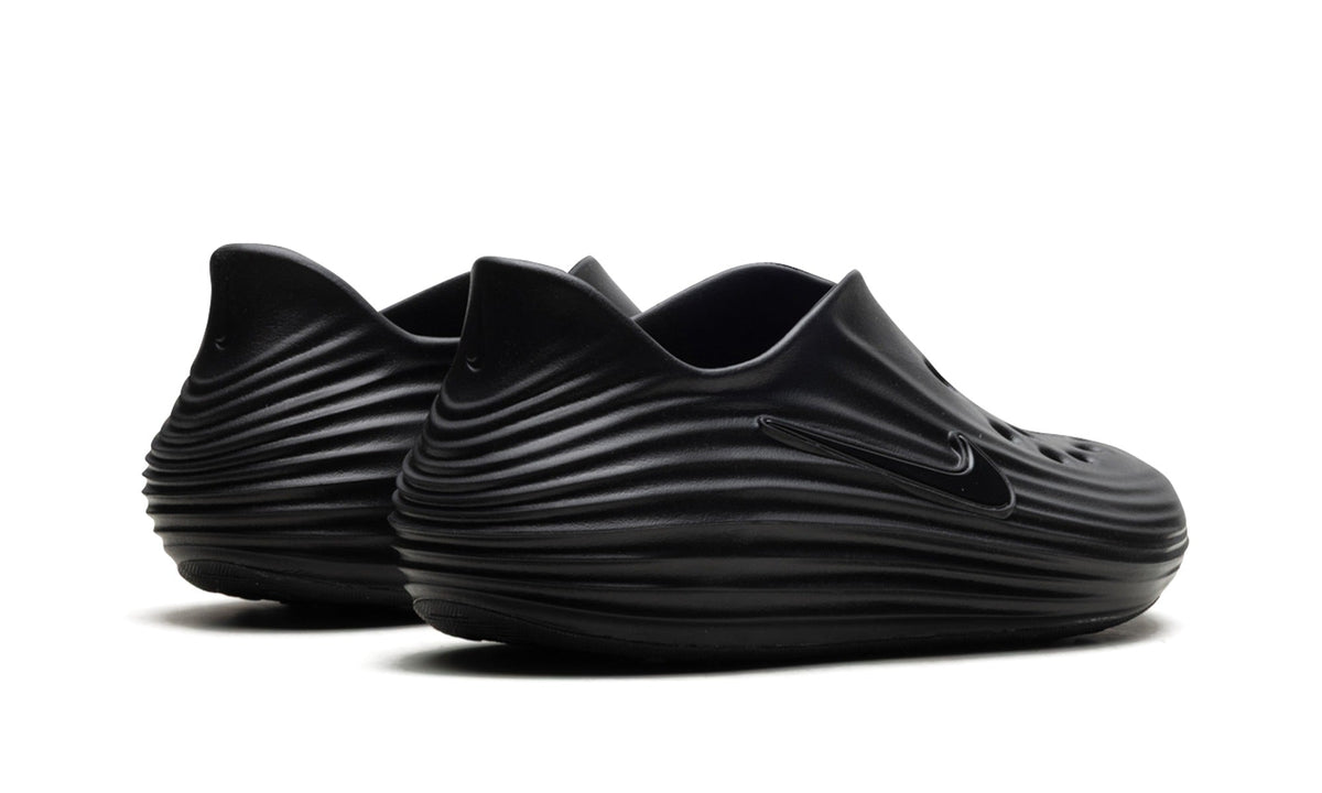 Nike ReactX Rejuven8 Slip-Ons in Black